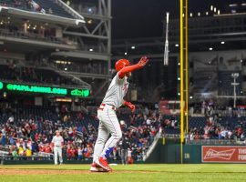 Bryce Harper flips his bat after smashing a two-run home run in the eighth inning of the Philadelphia Phillies victory over the Washington Nationals on Tuesday. (Image: Jonathan Newton/Washington Post)