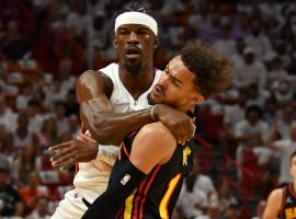 Jimmy Butler from the Miami Heat and Trae Young of the Atlanta Hawks collide during a pick-and-roll last season. (Image: Getty)