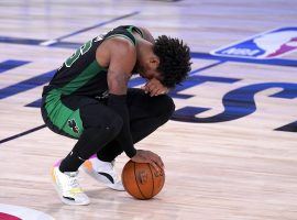 Boston Celtics guard Marcus Smart reacts to another loss to the Miami Heat in the Eastern Conference Finals. (Image: Mark J. Terrill/AP)