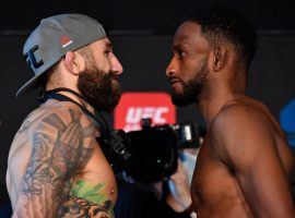 Michael Chiesa (left) and Neil Magny (right) will face off in the main event of Wednesdayâ€™s UFC card on Fight Island. (Image: Getty)