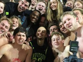 Steph Curry, a Davidson Alumni currently playing with the Golden State Warriors, jumped into the student section after a victory over St. Joe's at John M. Belk Arena in Davidson, NC. (Image: ESPN)