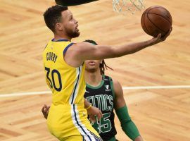 Golden State Warriors guard Steph Curry, seen here driving for a layup against the Boston Celtics, is the hottest player in the NBA right now. (Image: Harris Krane/Getty)