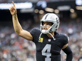 Derek Carr, quarterback from the Las Vegas Raiders, celebrates a touchdown pass at Allegiant Stadium in 2021. (Image: Getty)