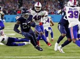 Derrick Henry from the Tennessee Titans, who were home dogs against the Buffalo Bills on Monday Night Football, scampers for a touchdown. (Image: Wade Payne/AP)