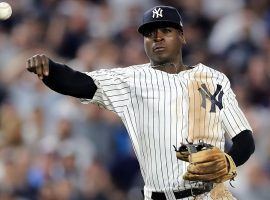 Didi Gregorius, NY Yankees shortstop, throws a runner out during a playoff game at Yankee Stadium in 2018. (Image: Elsa/Getty)