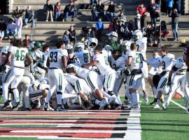 Dartmouth football players celebrate their Hail Mary victory on the last play of the game against Harvard. (Image: AP)