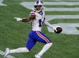 Stefon Diggs from the Buffalo Bills scores a touchdown and taunts a defender on the New England Patriots at Foxboro in 2020. (Image: Elise Amendola/AP)