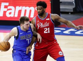 Joel Embiid from the Philadelphia 76ers defends Luka Doncic from the Dallas Mavs, and the two are the top two favorites to win the 2023 NBA MVP. (Image: Porter Lambert/Getty)