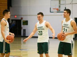 Robin Duncan, left, Ernie Duncan and Everett Duncan shoot around at practice at Patrick Gymnasium in Burlington, Vermont. (Image: Brian Jenkins/Vermont Free Press)