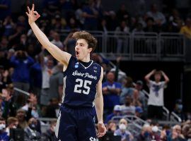 Doug Edert, a junior guard from Saint Peterâ€™s celebrates a 3-pointer during an upset against Kentucky. (Image: Getty)