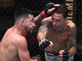 Franke Edgar (right) defeated Pedro Munhoz (left) by split decision in the main event of UFC on ESPN 15 on Saturday night. (Image: Chris Unger/Zuffa)