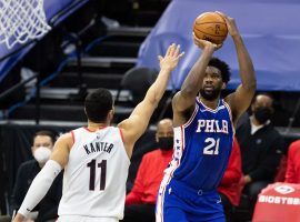 Joel Embiid from the Philadelphia 76ers taking a fadeaway jumper against Enes Kanter from the Portland Trail Blazers. (Image: Bill Streicher/USA Today Sports)