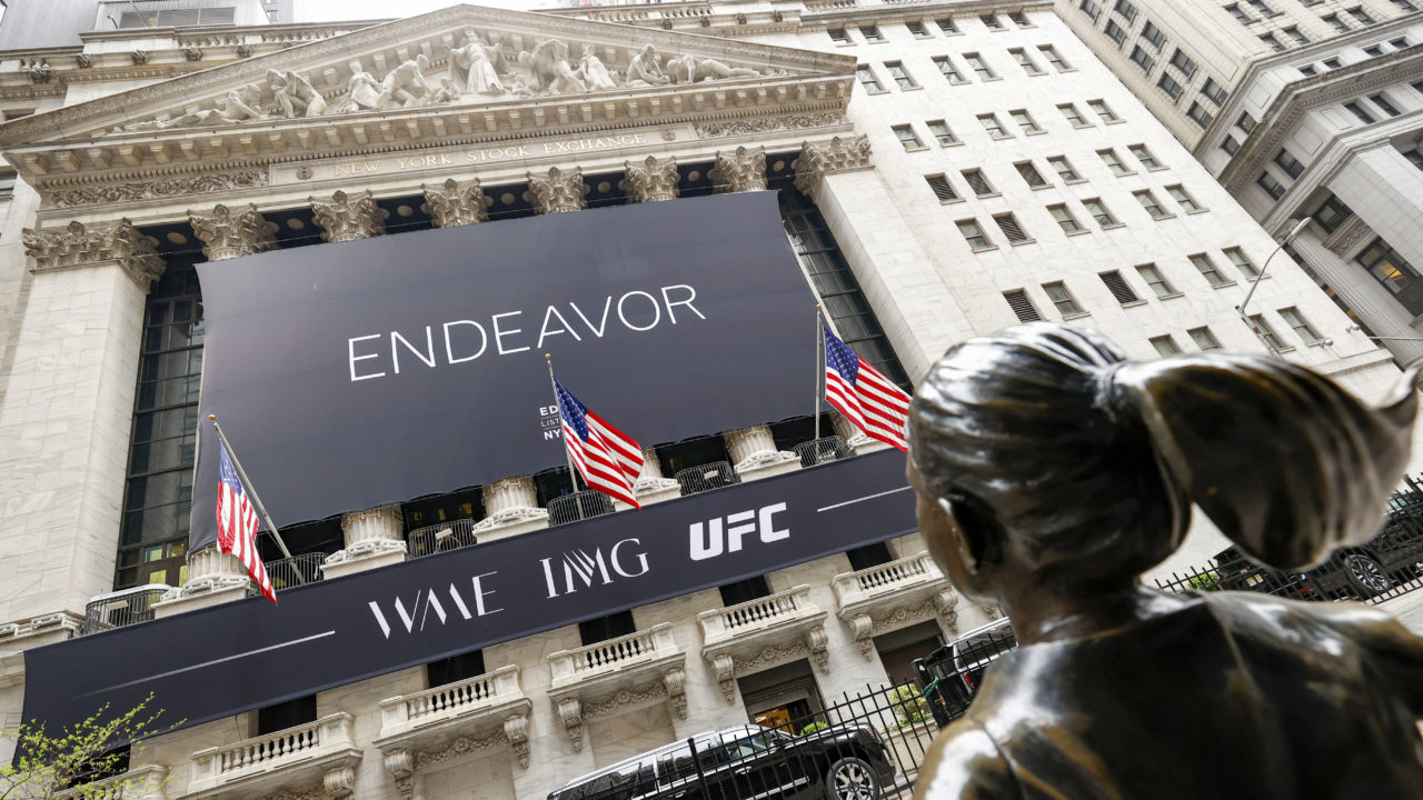 Endeavor lowers bid for OpenBet after market correction.