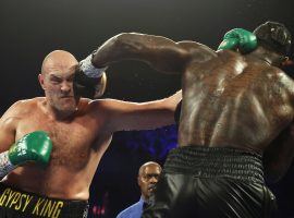 An arbitrator has ruled that Tyson Fury (left) must grant a rematch to Deontay Wilder (right) by Sept. 15. (Image: Getty)