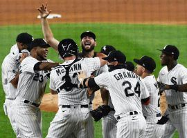 The Chicago White Sox mob pitcher Lucas Giolito after a successful no hitter bid against the Pittsburgh Pirates. (Image: Getty)