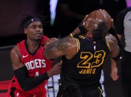 Houston Rockets swingman Daniel House, Jr. mugs LA Lakers star LeBron James in Game 1. (Image: Mark J. Terrill/AP)