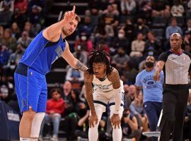 Luka Doncic from the Dallas Mavs defends Ja Morant of the Memphis Grizzlies last week, and the two square off again on Sunday. (Image: Justin Ford/Getty)