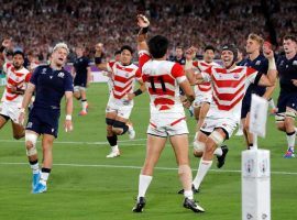 Japan celebrated making its first Rugby World Cup quarterfinal after defeating Scotland in its final group stage match. (Image: AP)