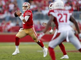 SF Niners QB Jimmy Garoppolo rolls out against the Arizona Cardinals at Levi Stadium in Santa Clara, CA. (Image: Scott Strazzante /SF Chronicle)