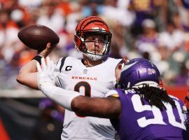 Joe Burrow from the Cincinnati Bengals drops back in an overtime win against the Minnesota Vikings as a home dog in Week 1. (Image: Marco Esquondoles/Getty)