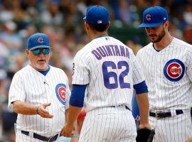 Chicago Cubs manager Joe Maddon takes the ball from relief pitcher Jose Quintana at Wrigley Field. (Image: Jon Durr/USA Today Sports)