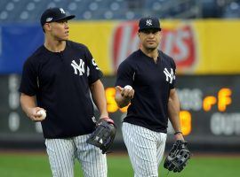 If outfielders Aaron Judge and Giancarlo Stanton can remain healthy this season for the New York Yankees, they'll have a shot at exceeding their projected win totals. (Image: Porter Lambert/Getty)