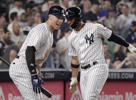 NY Yankees RF Aaron Judge congratulates SS Gleyber Torres after hitting a home run in Yankee Stadium in the Bronx, NY. (Image: Julie Jacobson/AP)