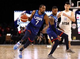 Kevin Durant dribbles by teammate Damian Lillard for Team USA during an exhibition game against Argentina in an exhibition game at the Mandalay Bay in Las Vegas. (Image: Getty)