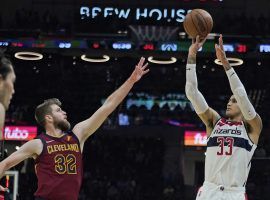 Kyle Kuzma from the first-place Washington Wizards knocks down a game-winnign 3-pointer against the Cleveland Cavs. (Image: Tony Dejak/AP)