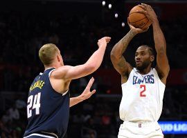 LA Clippers forward Kawhi Leonard playing for his new team against the Denver Nuggets in preseason. (Image: Harry How/Getty)