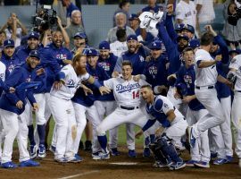 The LA Dodgers celebrate an extra innings victory in Game 3 of the 2018 World Series. (Image: Thomas York/Getty)