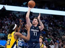 Luka Doncic from the Dallas Mavs shoots a floater over Isaiah Jackson of the Indiana Pacers. (Image: Getty)