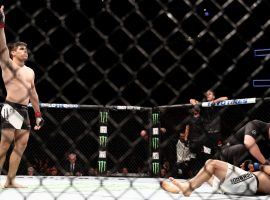 Vincente Luque (left) will try to recapture the magic of his first fight with Belal Muhammad (right) when the two face off in a rematch on Saturday night. (Image: Al Bello/Zuffa/Getty)