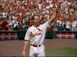 Cardinals 1B Mark McGwire acknowledging the crowd at Busch Stadium in St. Louis after he hit home run #62 in 1998. (Image: Getty)