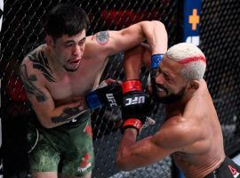 Brandon Moreno (left) will attempt to defend his flyweight title against former champion Deiveson Figueiredo at UFC 270. (Image: Getty)