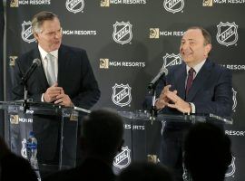 MGM Resorts International CEO James Murren (left) and NHL commissioner Gary Bettman (right) announce their new sports betting partnership at a press conference on Monday. (Image: Seth Wenig/AP)