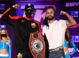 Emanuel Navarrete (left) will defend his WBO featherweight title against Christopher Diaz on Saturday night. (Image: Mikey Williams/Top Rank/Getty)