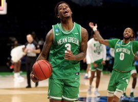 Javion Hamlet, the star of the North Texas Mean Green, celebrates an upset overtime victory over#4 Purdue in the first round of March Madness. (Image: Porter Lambert/Getty)