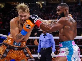 Jake Paul (left) won a split decision victory over Tyron Woodley (right) in their pay-per-view boxing matchup on Sunday. (Image: Getty)