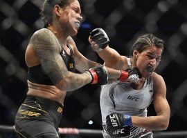 Julianna Pena (right) scored a stunning win over Amanda Nunes (left) to take the womenâ€™s bantamweight title at UFC 269 on Saturday. (Image: Chris Unger/Zuffa)