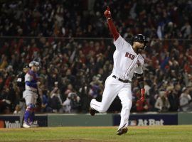 Eduardo Nunez celebrates after hitting a three-run home run for the Boston Red Sox against the Los Angeles Dodgers in Game 1 of the 2018 World Series. (Image: David J. Phillip/AP)