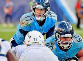 Tennessee Titans QB Ryan Tannehill takes a snap against the LA Chargers. (Image: Ryan Mansfield/AP)