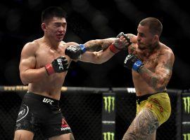 UFC on ESPN 8 â€“ which included this fight between Song Yadong (left) and Marlon Vera (right) was part of the first big weekend for sportsbooks during the COVID-19 pandemic. (Image: Douglas P. DeFelice/Getty)