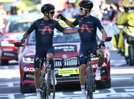 Richard Carapaz and Michal Kwiatkowski from Team Ineos celebrate at the fins line of Stage 18 of the Tour de France. (Image: Anne-Christine Poujoulat/Reuters)