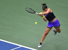 Bianca Andreescu hits a return against Serena Williams in the final of the 2019 US Open. (Image: AFP)