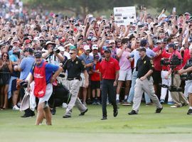 Tiger Woods walks up the 18th fairway on Sunday en route to winning the Tour Championship. (Image: Getty)