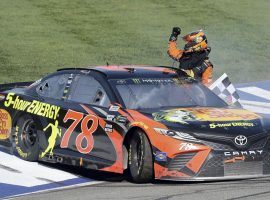 Martin Truex Jr. won the Auto Club 400 by 11 seconds to capture his first NASCAR Cup Series victory of the 2018 season. (Image: AP/Will Lester)