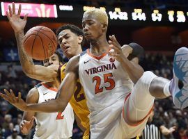 Arizona State forward Jalen Graham and Virginia forward Mamadi Diakite (25) fight for the ball during the Hall of Fame Tip Off at Mohegan Sun Arena. (Image: AP)