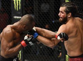 Kamaru Usman (left) will defend his welterweight title vs. Jorge Masvidal (right) at UFC 261 after dominating their first encounter in 2020. (Image: USA Today Sports)