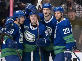 The Vancouver Canucks have stopped playing and practicing as the team deals with the worst NHL COVID-19 outbreak yet this season. (Image: Rich Lam/Getty)